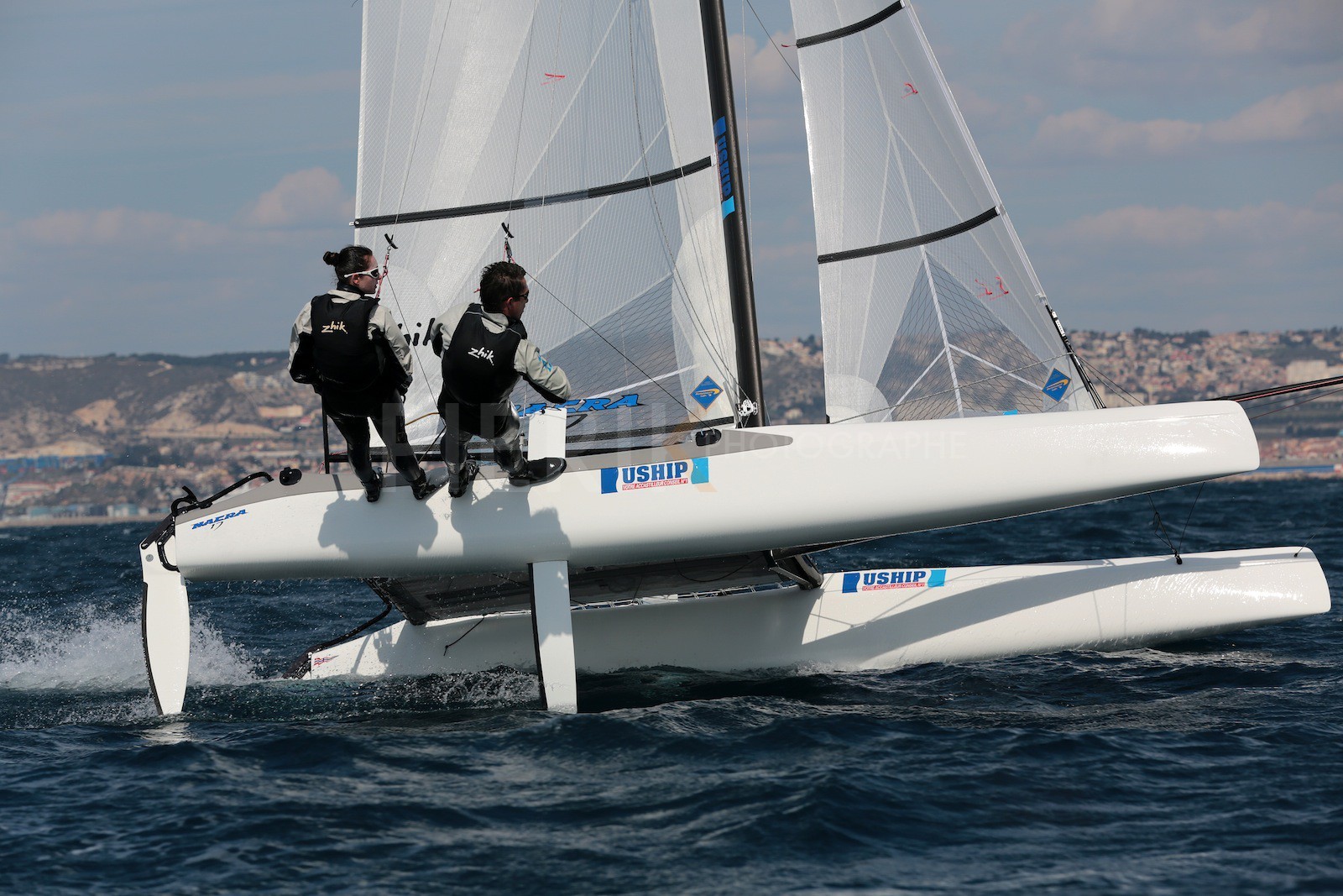 Ingrid Petitjean et Olivier Backes lors du baptême de leur Nacra 17 à la SNM. En route pour les JO de Rio