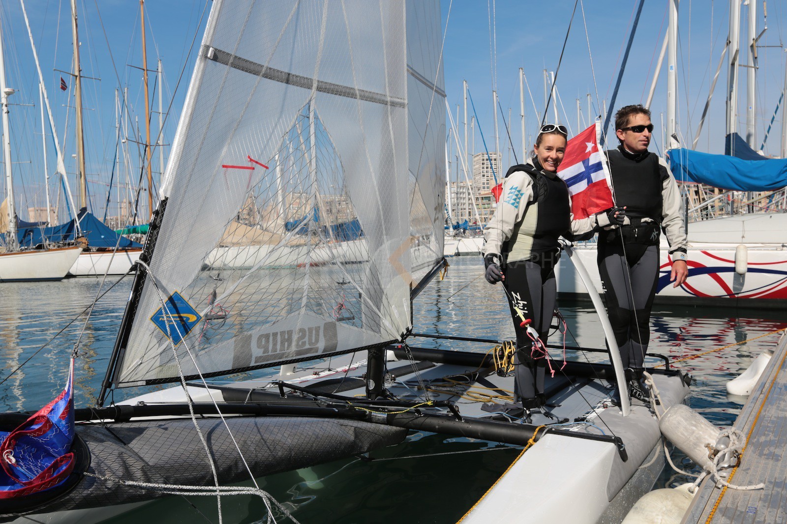 Ingrid Petitjean et Olivier Backes lors du baptême de leur Nacra 17 à la SNM. En route pour les JO de Rio
